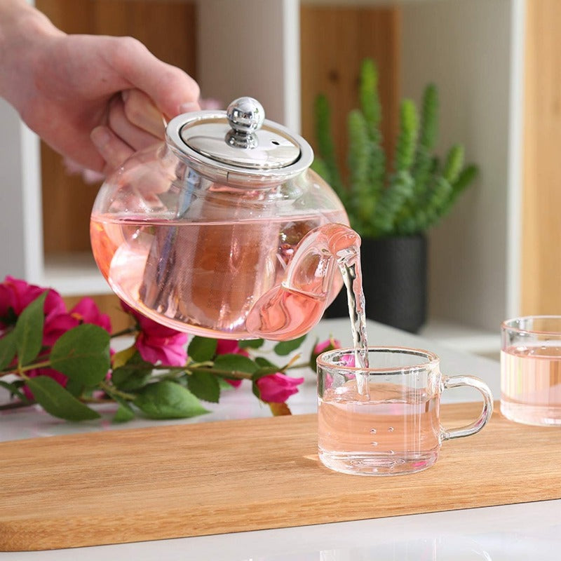 Theepot van borosilicaatglas met roestvrijstalen zetgroep