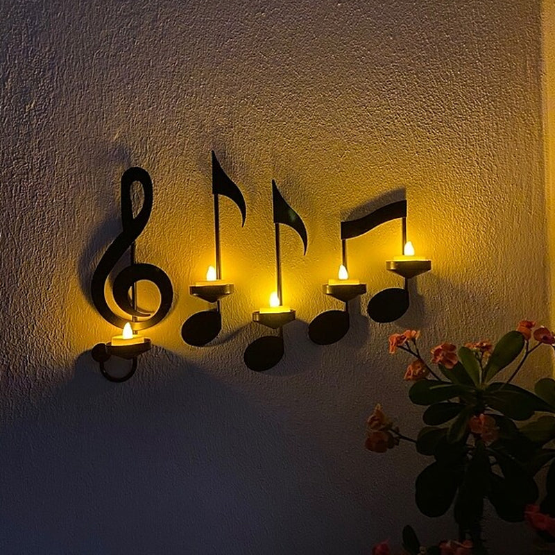 Aplique de pared con notas musicales en color negro