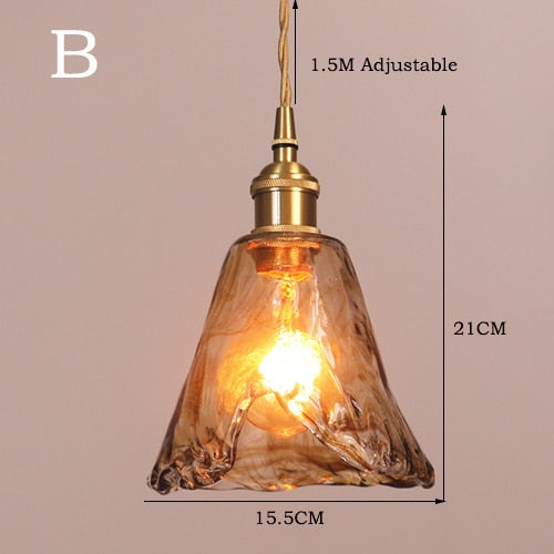 Hanglamp van messing en amberglas