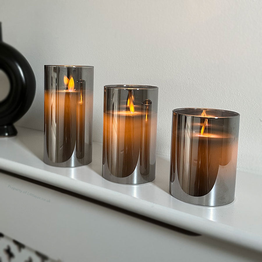 Set di 3 candele a colonna senza fiamma con involucro grigio fumo