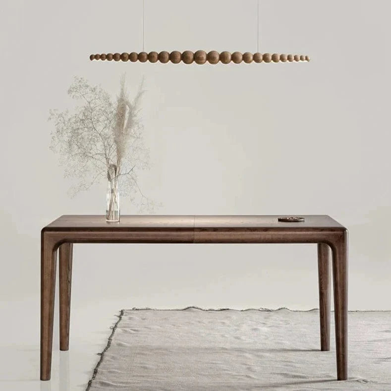 Lampadario con perline di legno