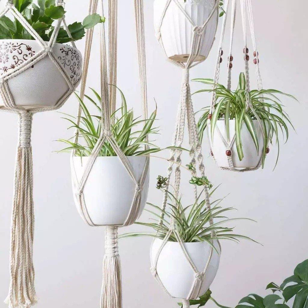 Set de 4 suporturi pentru plante din macrame handmade în stil boho