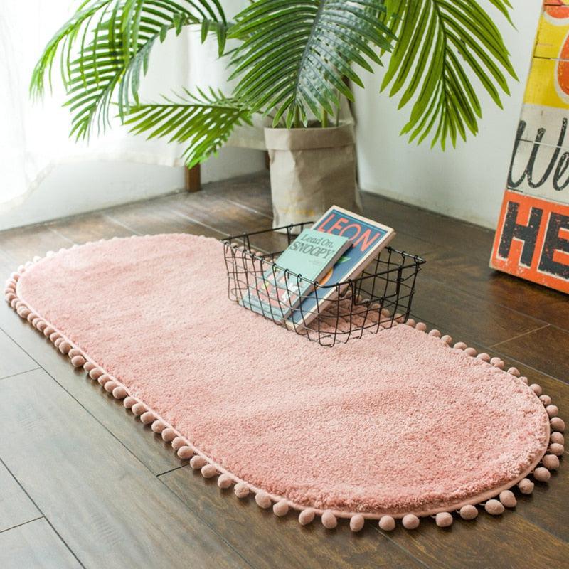 Pom-pom Trimmed Oval Anti-skid Rug