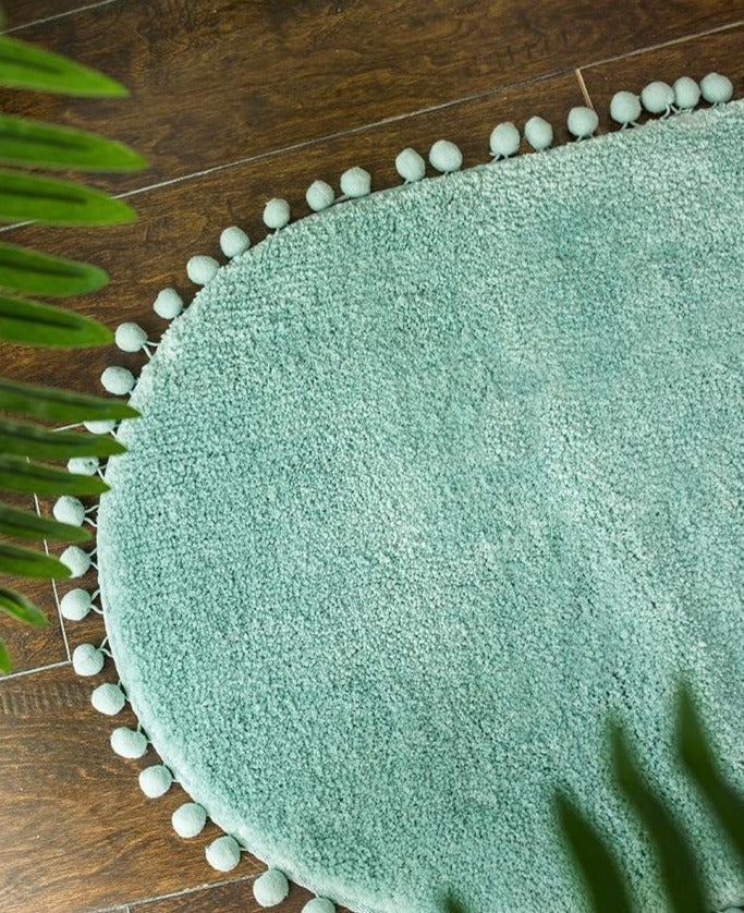 Pom-pom Trimmed Oval Anti-skid Rug