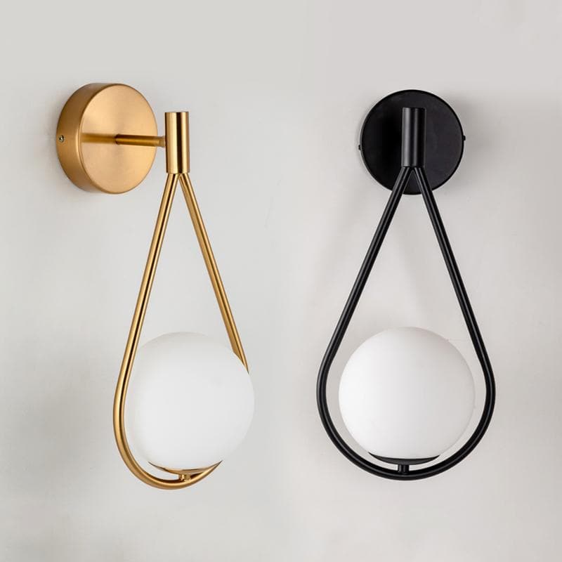 Loop Brass and Sphere Sconce