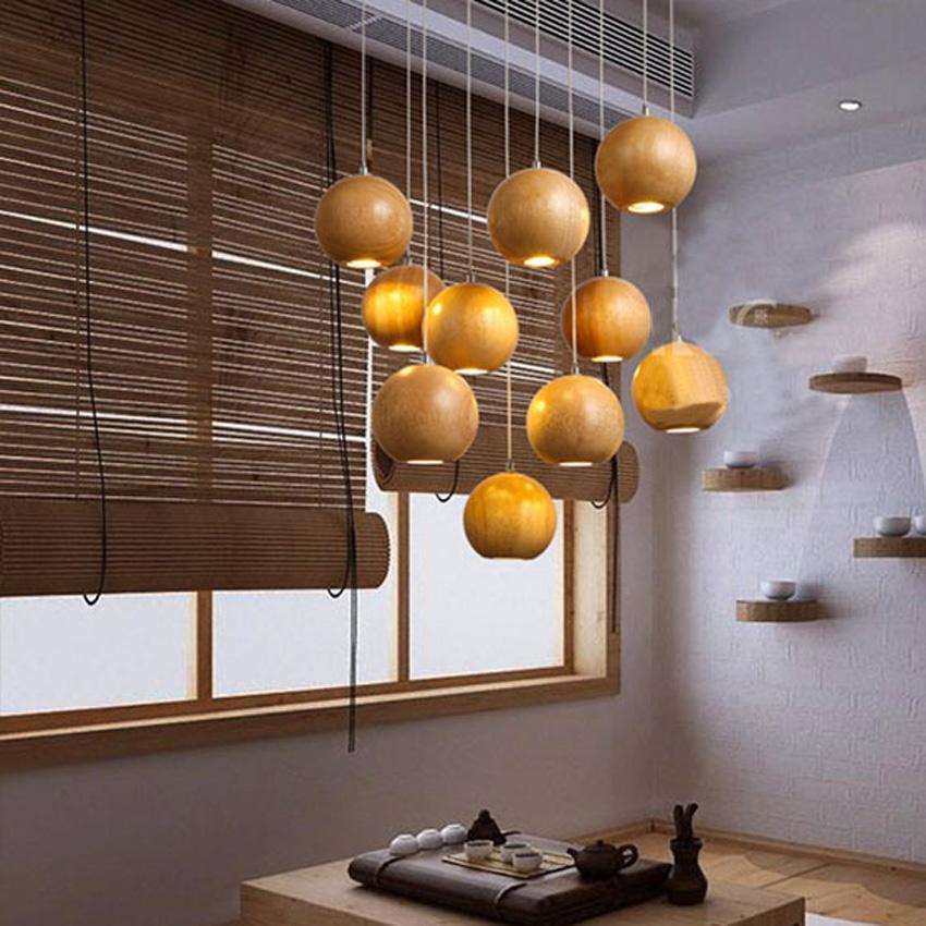 Lampadario moderno a sfera in legno massello