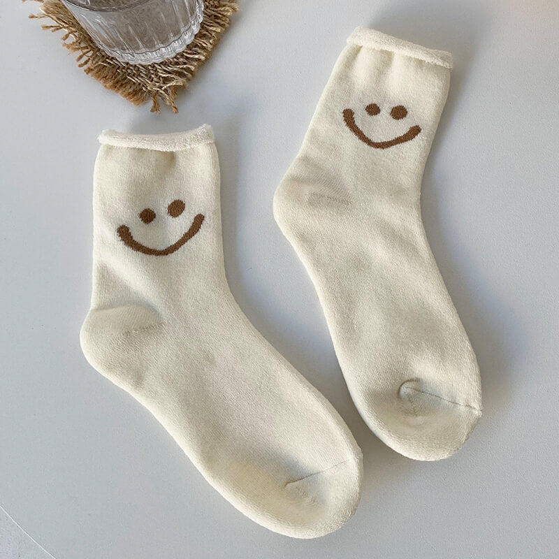 Paquete de calcetines con cara feliz